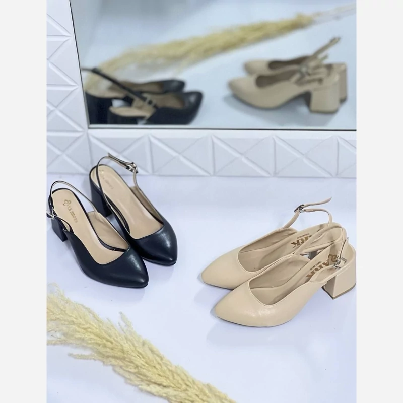 مدل کفش کوربیس مجلسی   سایز بندی  37-38-39-40-41  پاشنه پنچ سانت    رنگ بندی مشکی و کرم  جنس کار چرم صنعتی وارداتی
